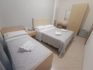 Postel nebo postele na pokoji v ubytování B&B Michael's Dream