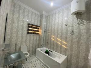 Koupelna v ubytování Vision Hotel apartment and suites