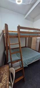 Un ou plusieurs lits dans un hébergement de l'établissement Bed and breakfast chez l'habitant