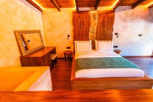Voodi või voodid majutusasutuse Hotel Thethi toas