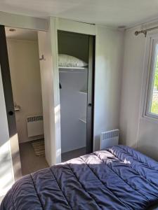 Postel nebo postele na pokoji v ubytování Mobil home Côte d'Opale