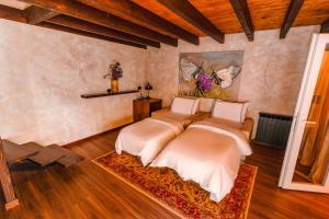 Voodi või voodid majutusasutuse Hotel Thethi toas