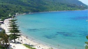 a view of a beach with people in the water at Casa Sofia in Agropoli
