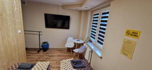 TV a/nebo společenská místnost v ubytování Travel House