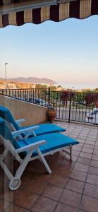 Balkon lub taras w obiekcie SunRise Den, a pie de playa, vista al mar y piscina