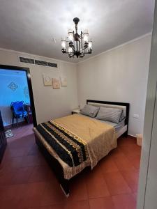 Giường trong phòng chung tại Porto Marina Prime View