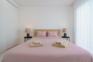 Uma cama ou camas num quarto em Villa Arkadie with private pool