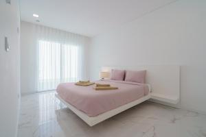 Uma cama ou camas num quarto em Villa Arkadie with private pool