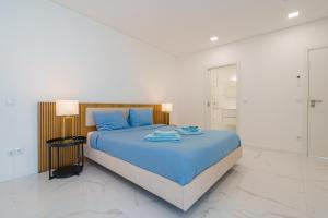 Uma cama ou camas num quarto em Villa Arkadie with private pool