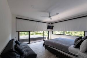 Ένα ή περισσότερα κρεβάτια σε δωμάτιο στο Archi Villa Sopetran +69 φωτογραφίες