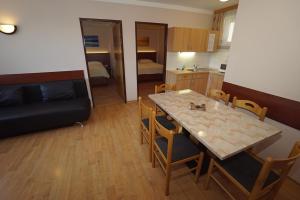 Posezení v ubytování Appartement Alpensee