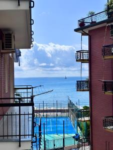 Πισίνα στο ή κοντά στο Bouganville vista mare
