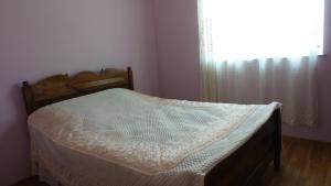 Postel nebo postele na pokoji v ubytování Nargiz's House