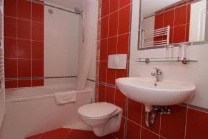 Koupelna v ubytování Garni Hotel St Anna