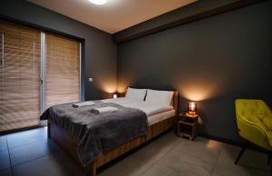 Ένα ή περισσότερα κρεβάτια σε δωμάτιο στο Apartament WIDOKOWY w Lagunie Beskidów