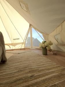 Postel nebo postele na pokoji v ubytování Kiideva Glamping