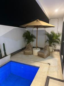 Bazén v ubytování Bali Bird Villa Canggu nebo v jeho okolí