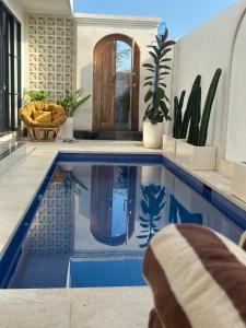 Bazén v ubytování Bali Bird Villa Canggu nebo v jeho okolí