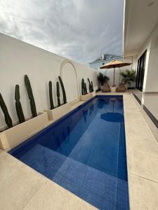 Bazén v ubytování Bali Bird Villa Canggu nebo v jeho okolí