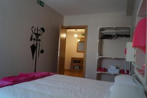 Cama o camas de una habitación en Apartamento Turístico “El Yugo”