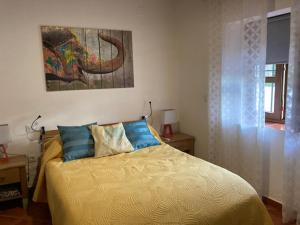 Un pat sau paturi într-o cameră la Casa Jara