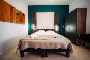 Rúm í herbergi á Rapture Gozo - Guesthouse