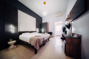 Rúm í herbergi á Rapture Gozo - Guesthouse