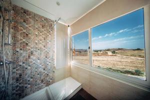 Baðherbergi á Rapture Gozo - Guesthouse