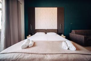 Rúm í herbergi á Rapture Gozo - Guesthouse