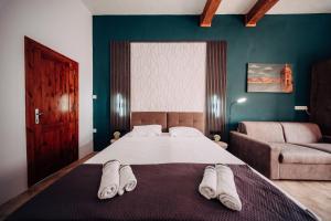Rúm í herbergi á Rapture Gozo - Guesthouse