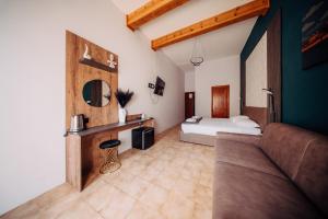 Rúm í herbergi á Rapture Gozo - Guesthouse