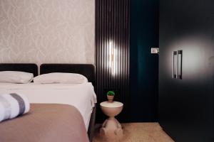 Rúm í herbergi á Rapture Gozo - Guesthouse