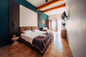 Postel nebo postele na pokoji v ubytování Rapture Gozo - Guesthouse + 37 fotografií