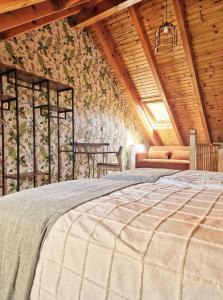 En eller flere senge i et værelse på El Puyal de Benas