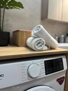 a towel sitting on top of a washing machine at La casa in Chios