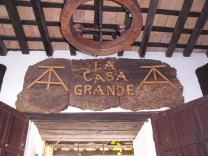 a sign that says la casa grande on a building at Posada La Casa Grande in Jimena de la Frontera