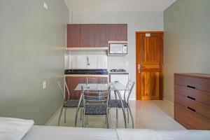 Una cocina o cocineta en Pinheiro Flat Hotel