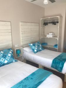 Cama o camas de una habitación en Apartamento Turístico “El Yugo”