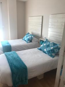 Cama o camas de una habitación en Apartamento Turístico “El Yugo”