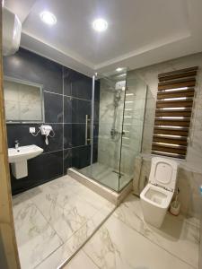 Koupelna v ubytování De Padova Hotel