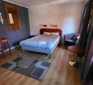 Postel nebo postele na pokoji v ubytování Hotell Mikaelsgården