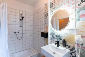Koupelna v ubytování MUE Cubes - Capsule Hotel