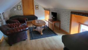 Posezení v ubytování Hotell Mikaelsgården