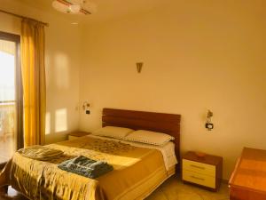 Postel nebo postele na pokoji v ubytování Vista mare e Dolce Vita loft romantico a Diamante