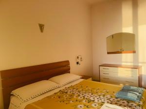 Postel nebo postele na pokoji v ubytování Vista mare e Dolce Vita loft romantico a Diamante