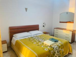 Postel nebo postele na pokoji v ubytování Vista mare e Dolce Vita loft romantico a Diamante