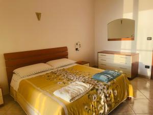Postel nebo postele na pokoji v ubytování Vista mare e Dolce Vita loft romantico a Diamante