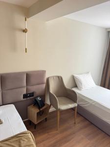 Postel nebo postele na pokoji v ubytování Vion Hotel