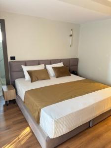 Postel nebo postele na pokoji v ubytování Vion Hotel