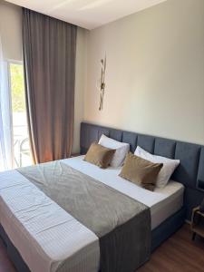 Postel nebo postele na pokoji v ubytování Vion Hotel